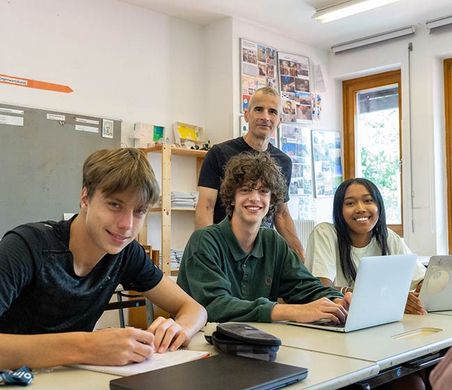 IBWISE students learning with a teacher